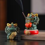 Creative Chinese style lion ornaments with gold and good persimmons, a pair of gift boxes