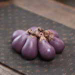 Yixing purple sand eggplant tea pet handmade bionic plants vegetables fruits purple qi eastward tea set ornaments sculpture