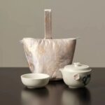 Whimsical Cat & Sakura Tea Set – Handcrafted Ceramic Duo with Brocade Carry Bag